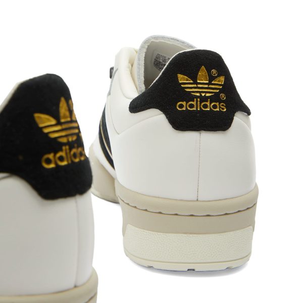 Adidas Rivalry 86 Low Cloud White/Core Black/Ivory (IF6262) белого цвета